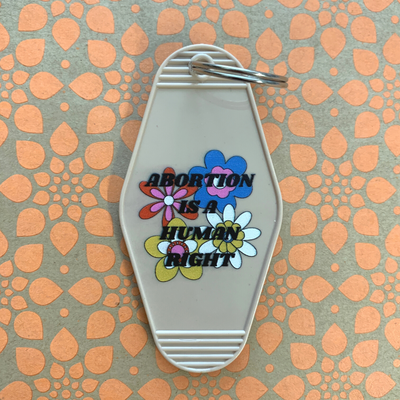 Abortion is a Human Right Keychain in Groovy '70s Flower Print