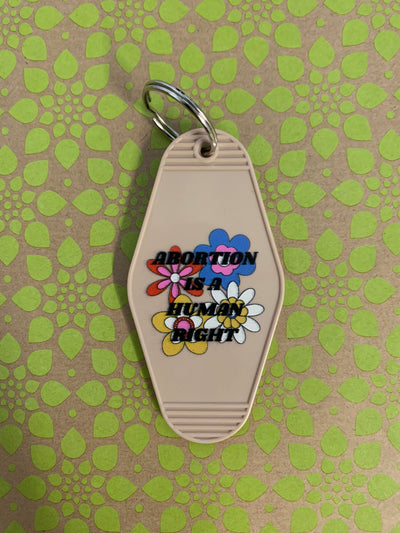 Abortion is a Human Right Keychain in Groovy '70s Flower Print